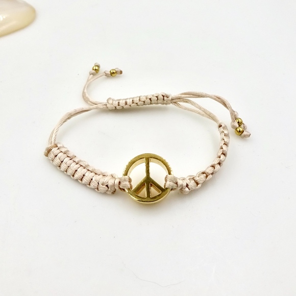 Juicy Couture Jewelry - JUICY COUTURE Macramé Peace Sign Bracelet
